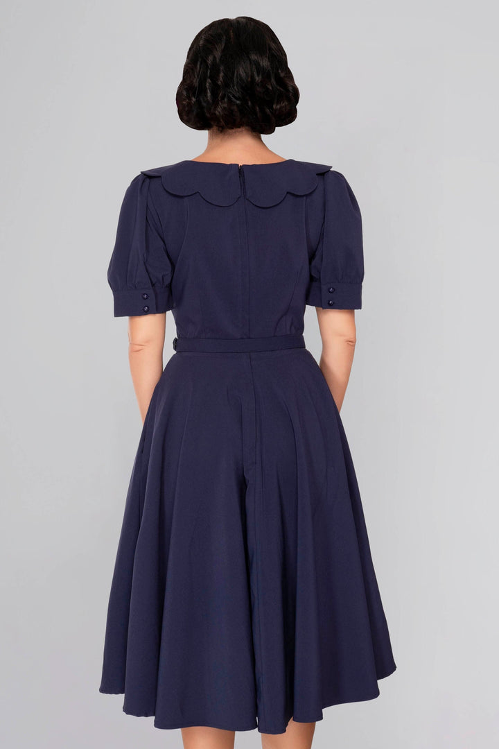 Brenda's navy blue flared dress